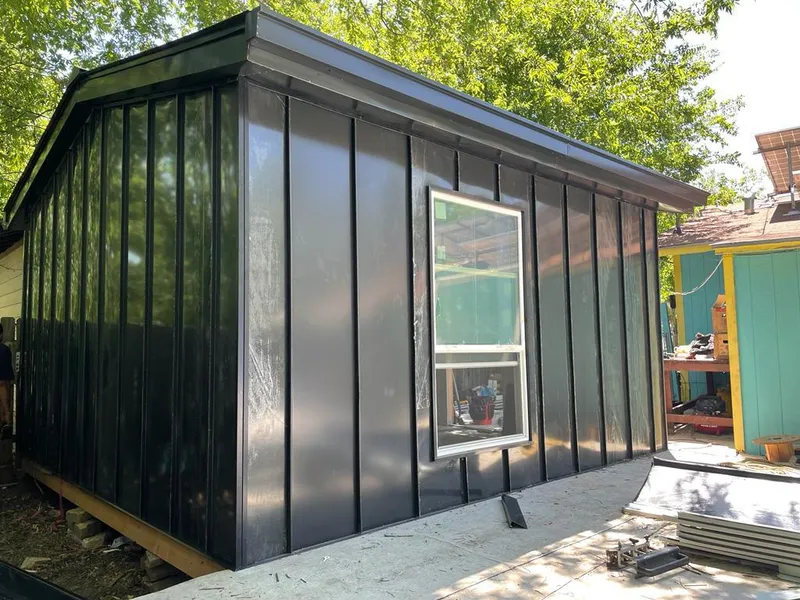 Black standing seam metal wall panels for Roof Inspection in Valley Stream